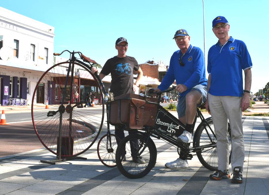 Preservation through restoration: Robert Frith, Robert Hunt and Phil Harris with the penny farthing from their collection. 