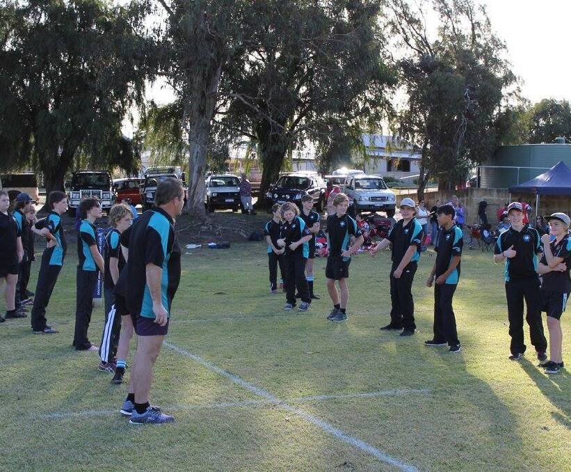 The Collie Eagles Junior Y7 Football Club forming their guard of honour.