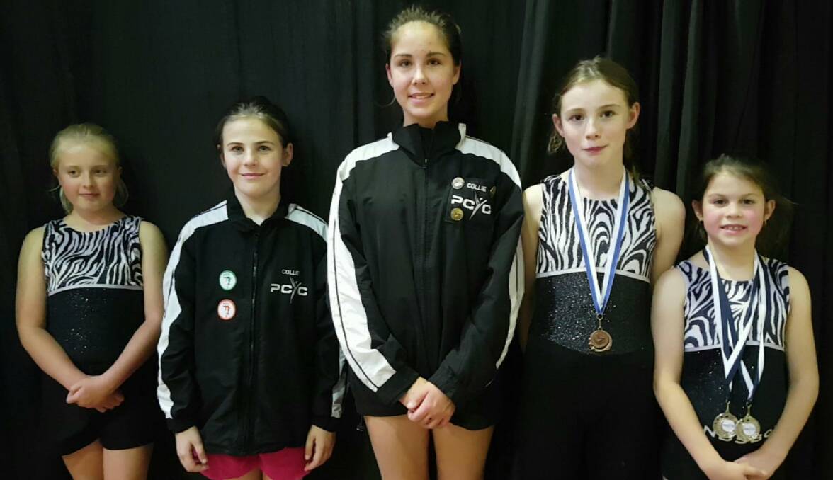 Great effort: Cahri Wilson, Alexis Milne, Zoe Carter, Merica Kerr and Heidi Ireland celebrate the PCYC gymnastics team's successes in the Police Citizens Youth Club championships. Photo: Supplied. 