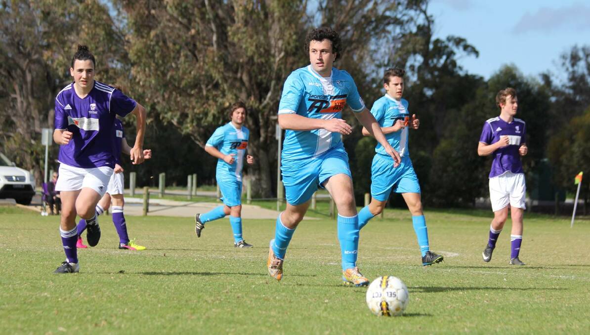 Team Effort: Cameron Vallesi takes the ball forward with team mates Ricky Colombera and Hayden DeAngelis. 