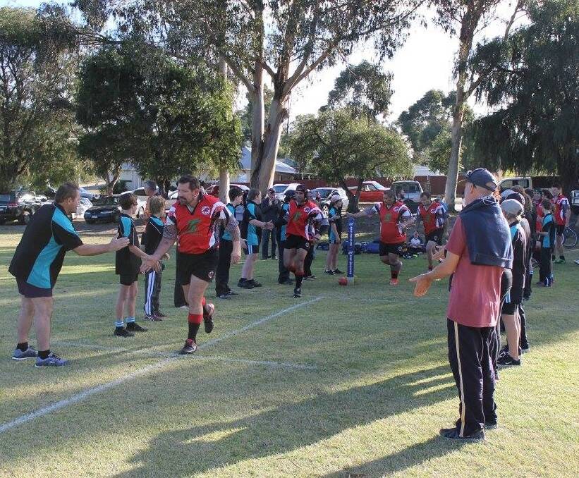  Coach Peter Bellden running through with the Collie Mongrels rugby team.