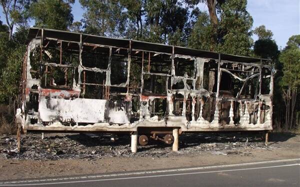 BURNED OUT: the hill climb timing caravan was first moved then torched by vandals. 