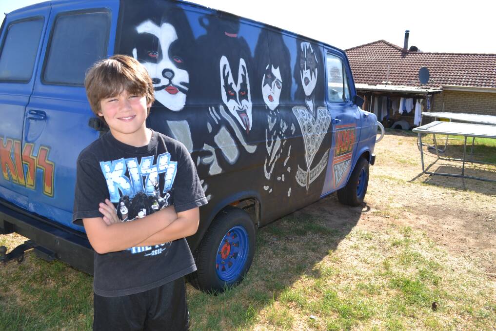 Rock and roll: Sage Mileto, 10, and his family will drive to Perth in their decorated van to watch Kiss and Motley Crue perform.
