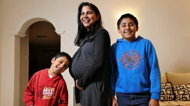 Seema Singh and with her sons, from left, Uday and Kanwar. Photo: Justin McManus