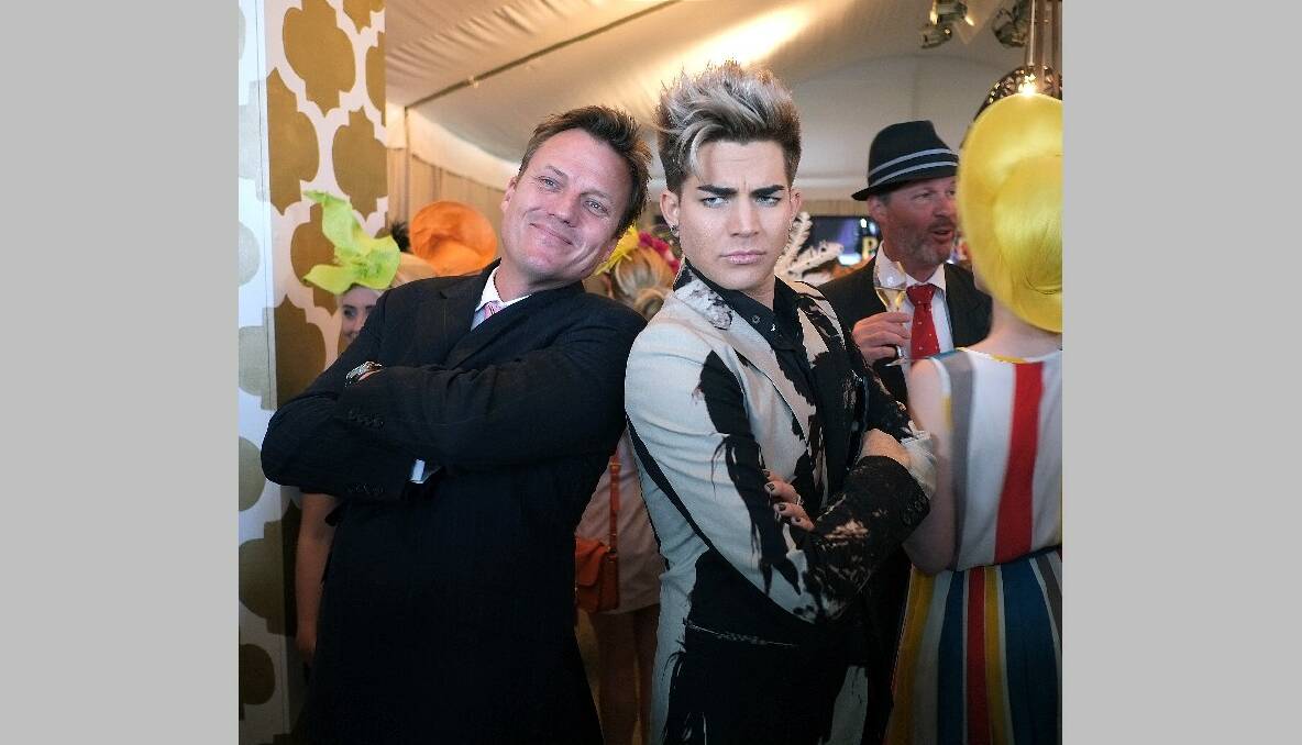 Photo of Adam Lambert with James Antony Brayshaw at the Beck Caulfield Guineas Day on Saturday October 13, 2012. Photo: The Sunday Age/Luis Enrique Ascui