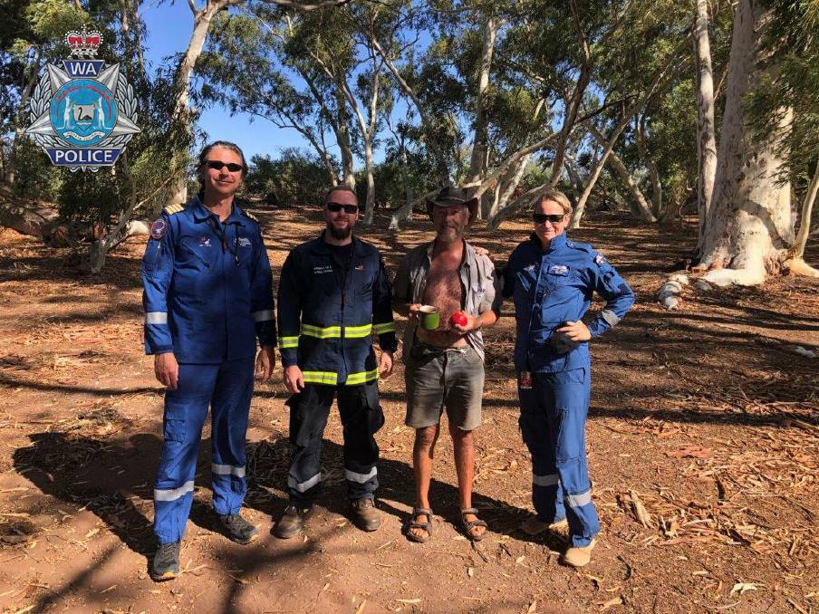 Safe. Phil Blampied's and his rescuers. Photo: WA Police