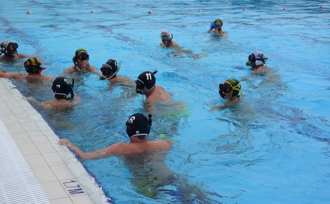 Shooting and scoring: All of the underwater hockey senior teams fought hard and showed good sportsmanship on the day. 