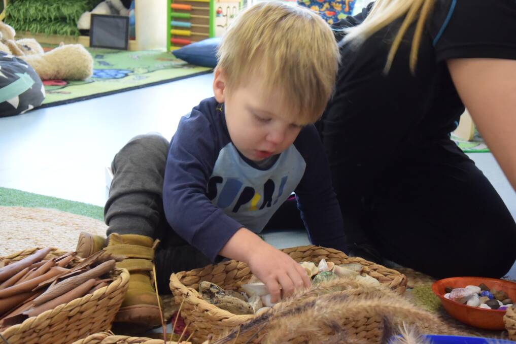 Bark, rocks and leaves: Andrew took part in nature play activities alongside classmates and carers this week.