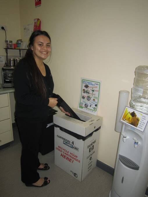 Endless cycle: West Australian Community Resource Centre trainee Mesha Barritt recycling for a cause. 