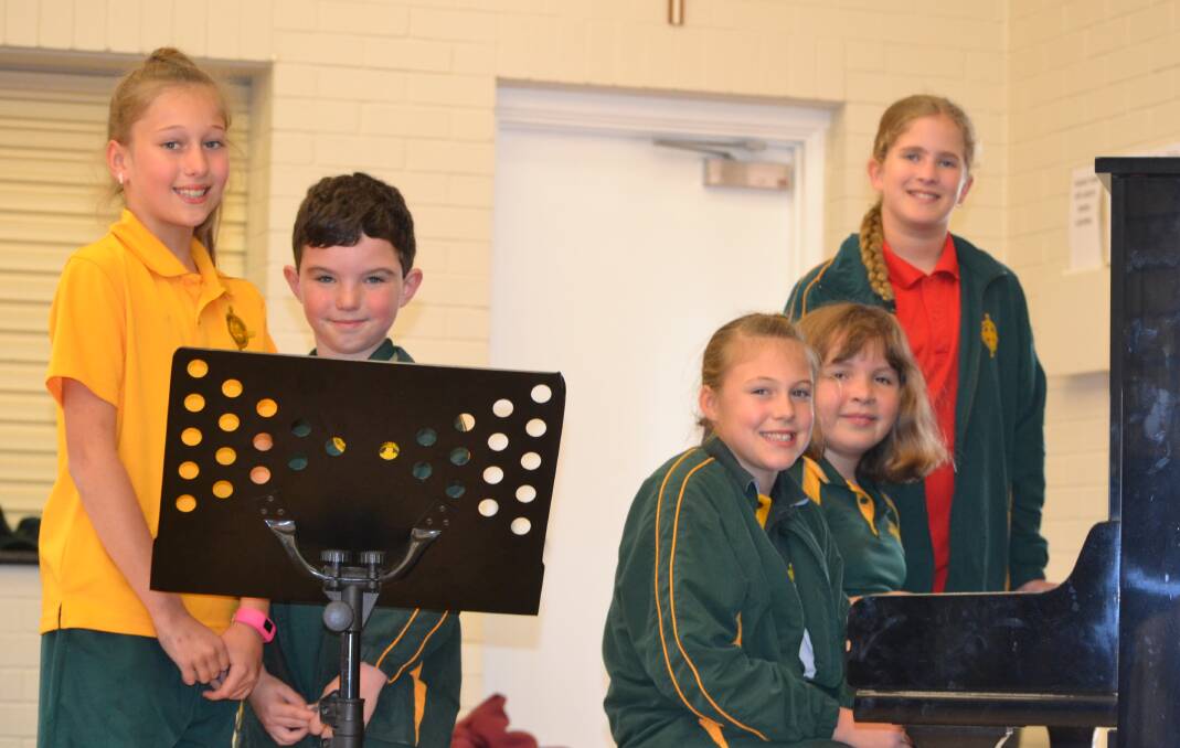 Music and lyrics: St Brigid's Primary School students Ava Roney, 9, Dillon Wood, 8, Charlotte Coman, 9, Alli Greenmount, 10, and Amara Mumme, 11. Photo: Collie Mail. 