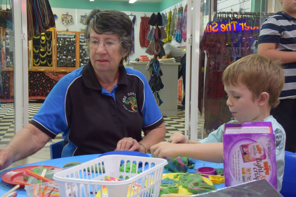Carers and kids: Bernadette assisted Elliot with creating wild and wonderful play-doh creations during the day. 