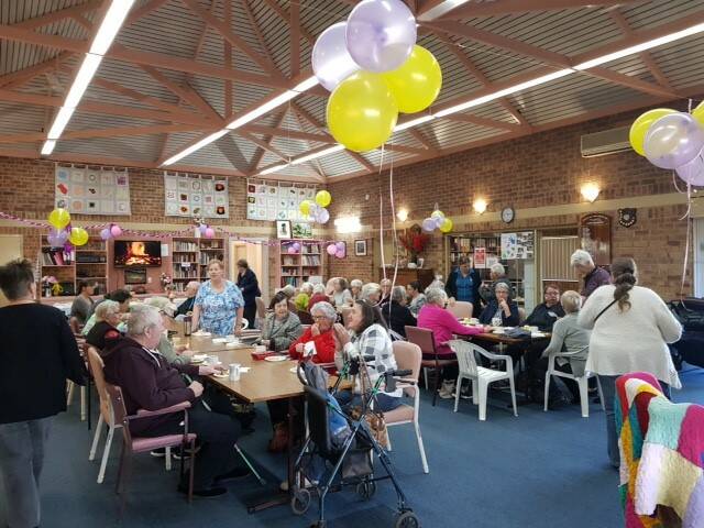 In the moment: Community members and Home Community Care representatives took part in Australia's Biggest Morning Tea earlier this month. Photo: Supplied. 
