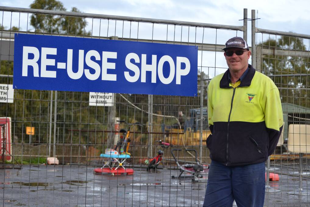 Helping out: Shire of Collie works department general hand Frank Becker at the newly-opened Re-Use Shop. Photo: Collie Mail. 