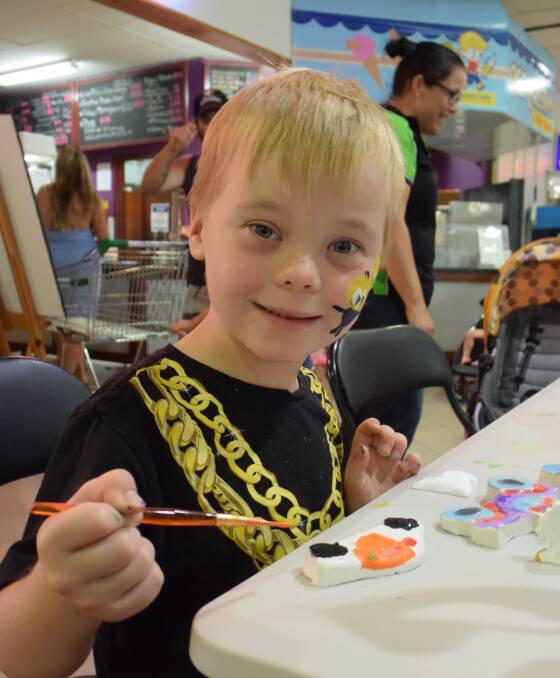 Creating art: Rylan spent the morning painting, drawing, getting his face painted and playing with play-doh on Wednesday, February 25 thanks to Kidz Cottage's activity day. 