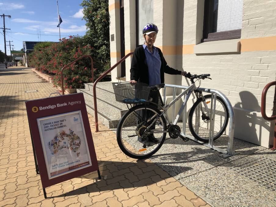 RACK 'EM UP: Rebecca South, Coordinator at West Arthur CRC and a keen cyclist, has found the new bike rack outside the centre very useful.