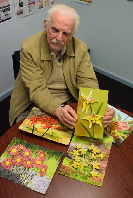 from scraps to art: Collie artist Frank Over shows off the beautiful works of art he created using offcuts of linoleum.  