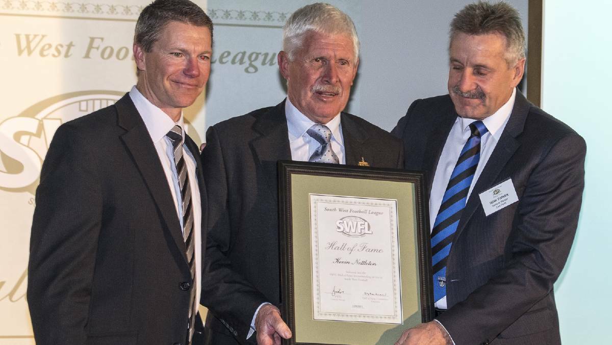 South West Football League hall of fame field umpire Kevin Nettleton (centre) will make his return to umpiring after more than a year and a half off with serious injuries. Photo : Ashley Pierce.
