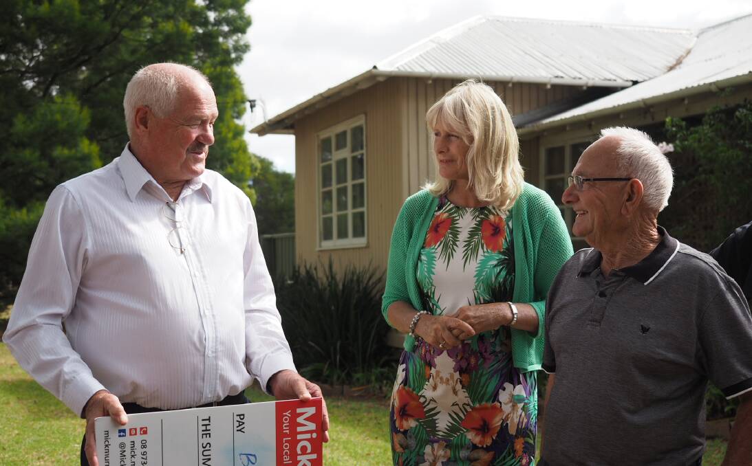 Collie-Preston MLA Mick Murray recently visited the historic Fettler's Park cottages in Boyanup to hand over a $10,000 grant for their upgrade. Photo: supplied