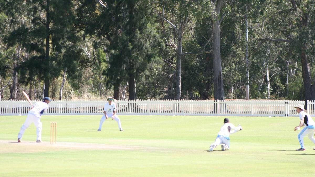 C-grade wicketkeeper Jarved Dallywater takes a diving catch. Photo supplied.