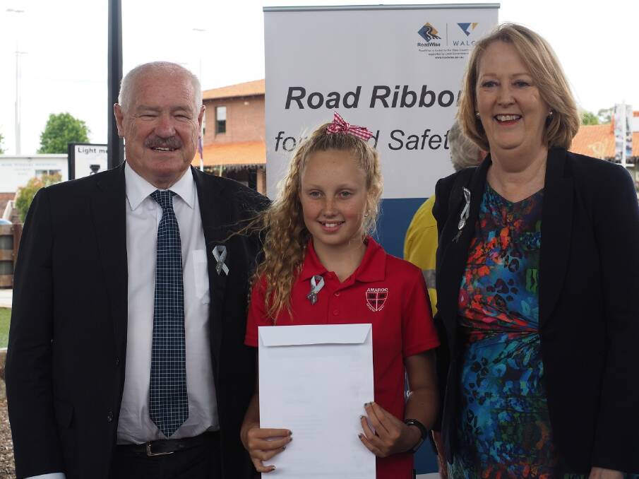Collie-Preston MLA Mick Murray and Road Safety Minister Michelle Roberts with one of last year's Road Safety Calendar Competition winners Milla Harker. Photo: supplied