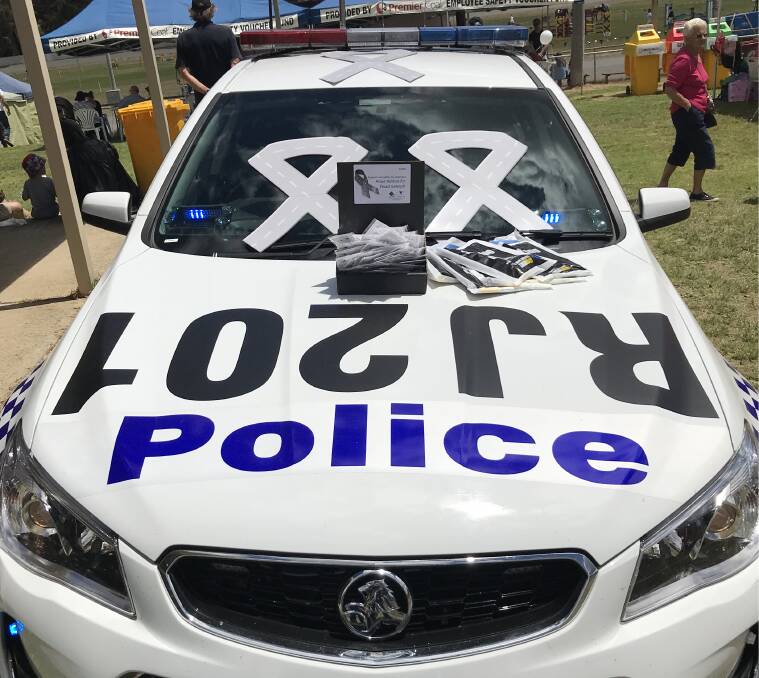 Road Ribbon: Collie Police were out spreading the road safety message at the Collie Show. Photo: supplied.
