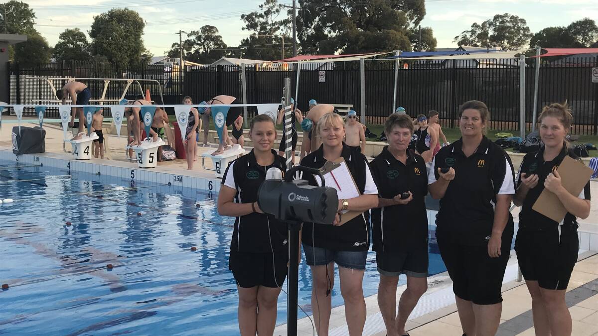 Collie Swimming Club time keepers and swimmers testing out the new start system. Photo: supplied.