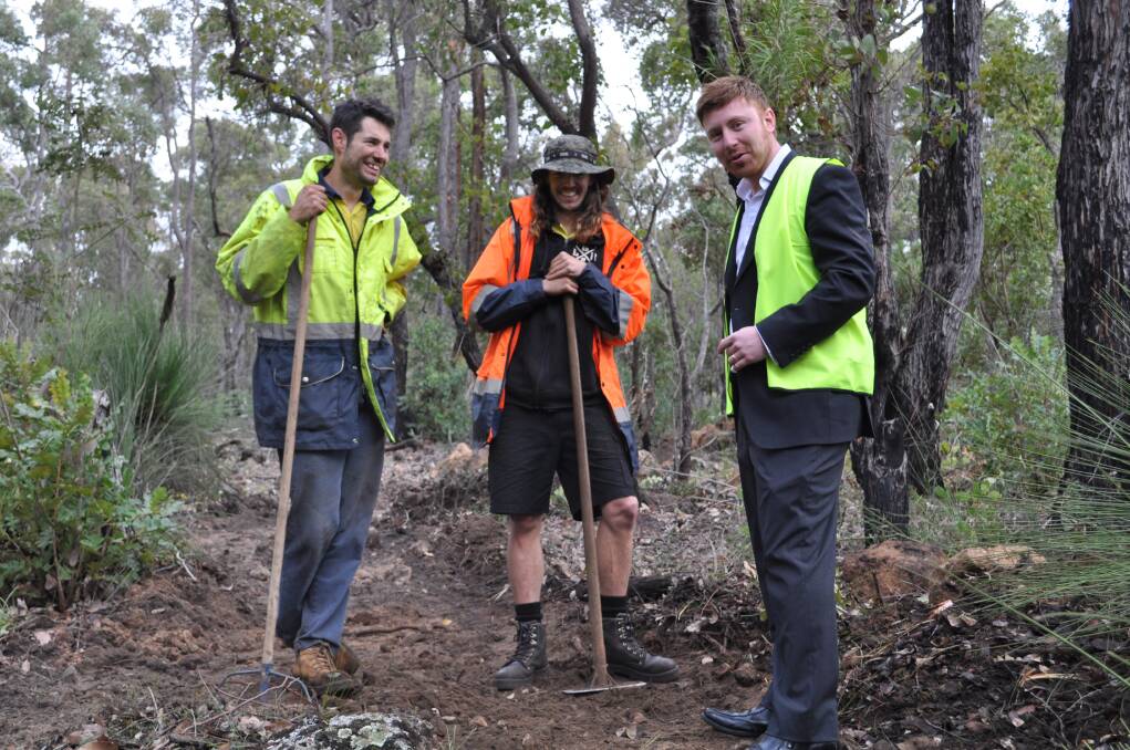 At work: Shire of Collie lead trail builder Deon Baker, trail builder Gerran Turner and Director of Development Services Andrew Dover. Photo: Thomas Munday. 
