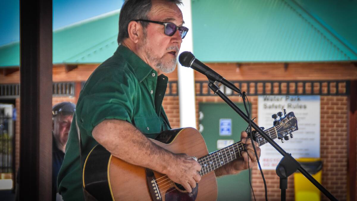 Country music legend John Williamson performs for the Collie community on a sunny Thursday. 