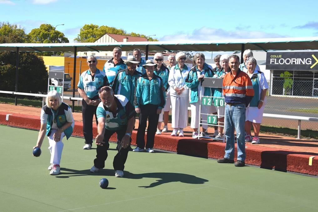 On the green: The Collie Bowling Club have installed their new scoreboards thanks to a grant from Premier Coal as part of their Community Support Program. Photo: Shannon Wood. 