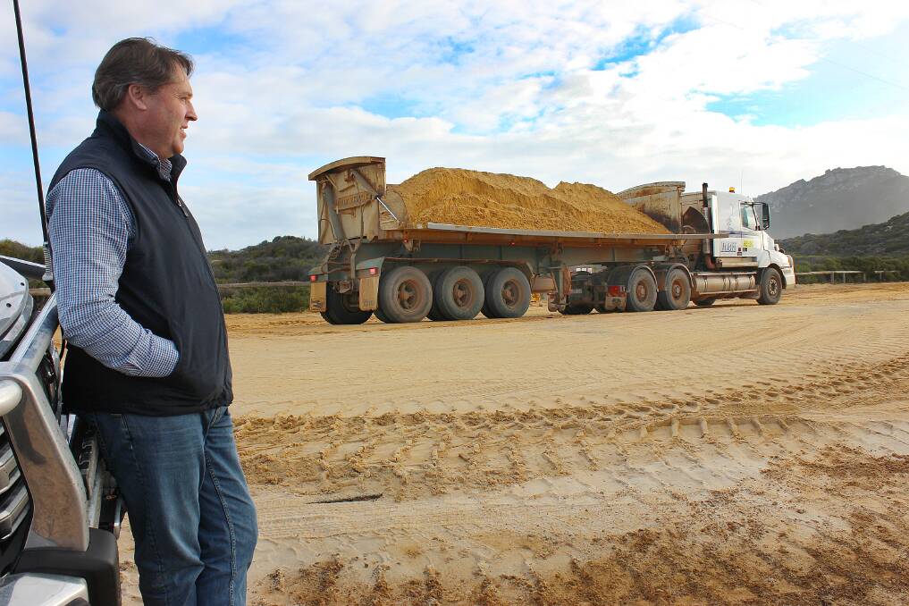 Federal Member for O’Connor Rick Wilson surveys the building of a new road in O’Connor. Photo: supplied