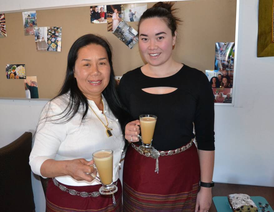 Wannaporn and daughter Raewyn Hooley with bulletproof coffee, which consists of brewed coffee, grass-fed unsalted butter and medium-chain triglyceride (MCT) coconut oil. Photo: Breeanna Tirant 