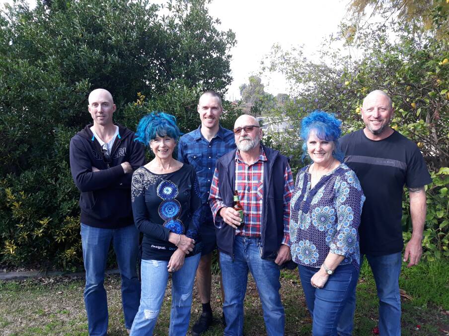 Jackson's family shaved their heads, dyed their hair blue and started growing mustaches to help raise awareness and money for leukaemia. Photos supplied.