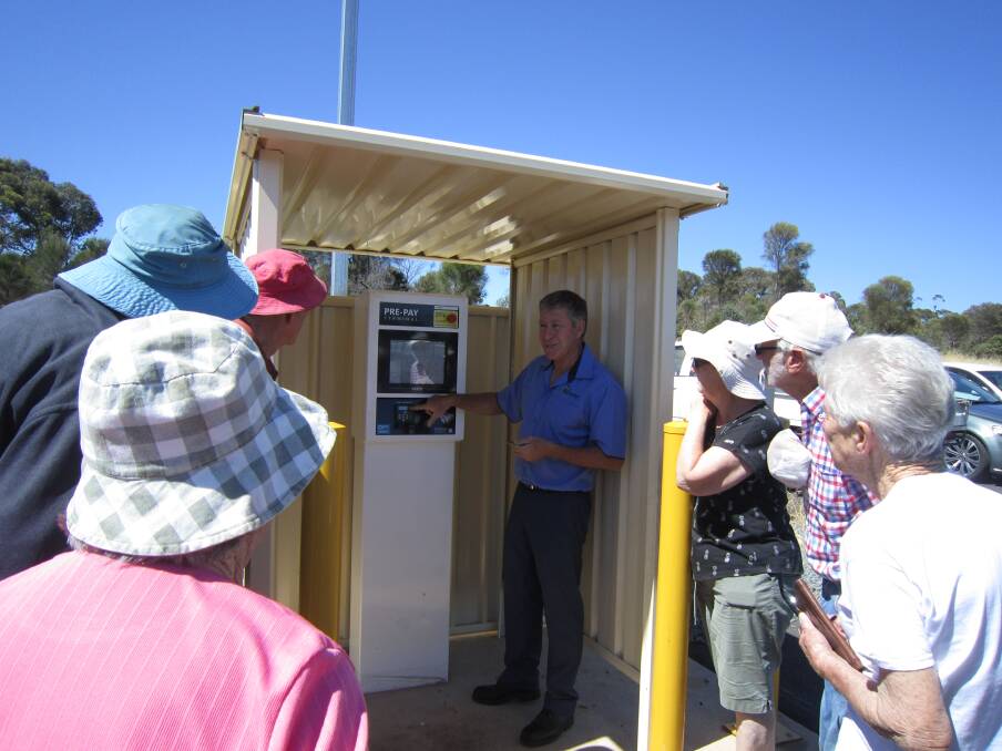 Fuel up: Ray Narducci from Great Southern Fuels giving some info about how to operate the automated fuel bowsers in Darkan. Photo: supplied.