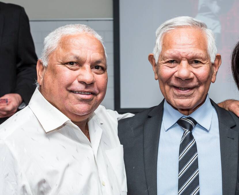 Brothers in arms: Former Roelands Mission child Francis Khan with two-time AFL Premiership winner Syd Jackson in 2016. Photo: Chris de Blank.