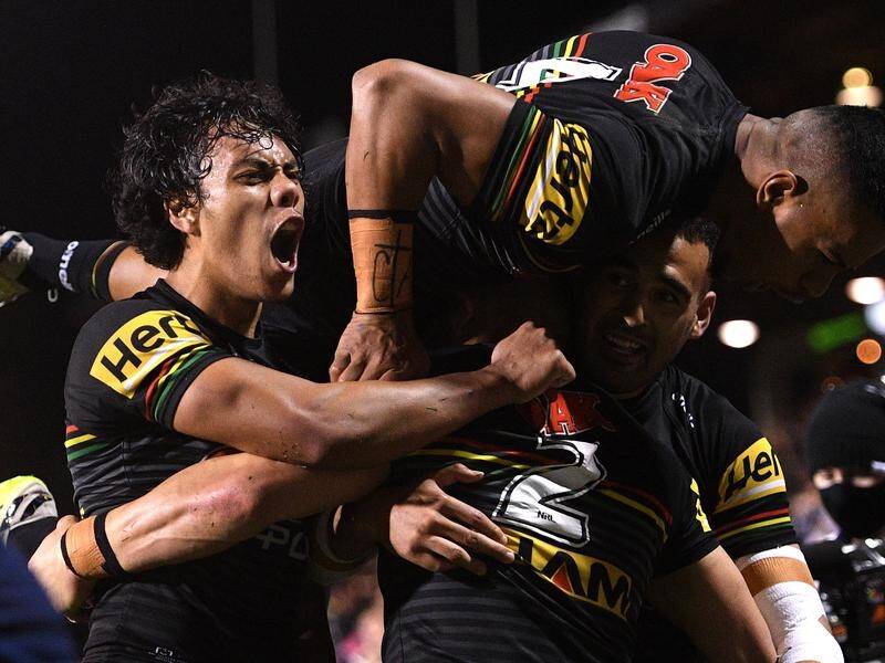 Penrith have made it 13 NRL wins in a row, beating Parramatta 20-2 in the western Sydney derby.