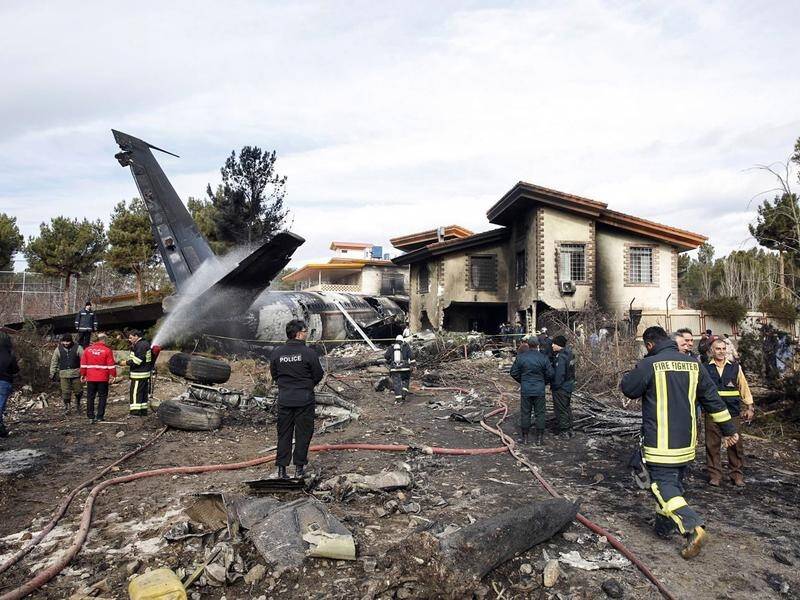 The wreckage of a Boeing 707 cargo plane that crashed near the Iranian city of Karaj.