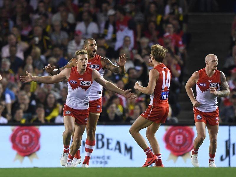 Lance Franklin (third from left) and his Sydney Swans team maintain their high hopes.