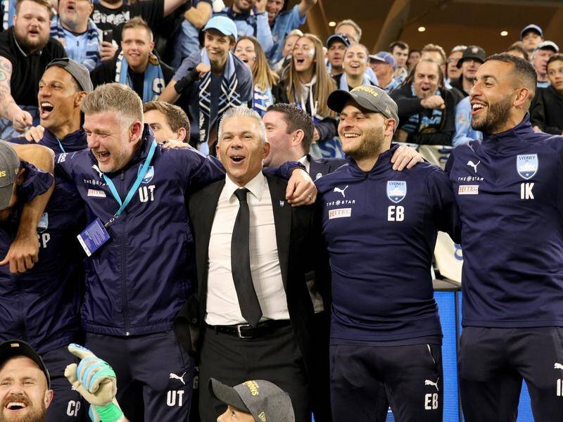 Steve Corica (c) led his Sydney FC side to A-League grand final glory after a penalty shootout.