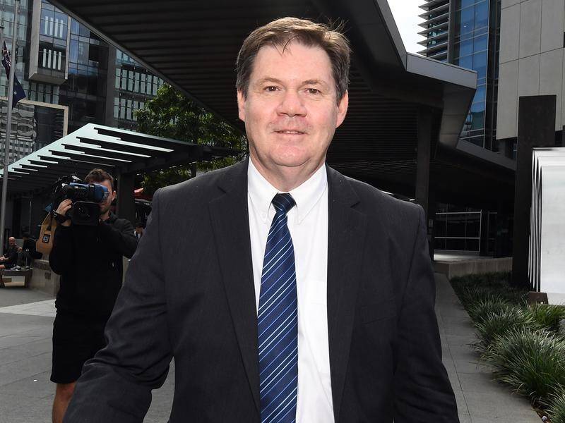 Ex-Ipswich council chief executive Jim Lindsay will face trial on a official corruption charge