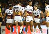 Brisbane's Reece Walsh (second right) suffered cramp during the Broncos' win over Wests Tigers. (Brett Costello/AAP PHOTOS)