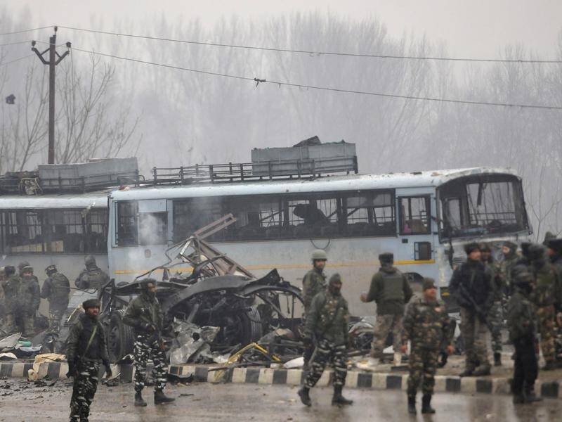 Pakistan-based Islamist militants have claimed a car bomb in Kashmir that killed 44 policemen.