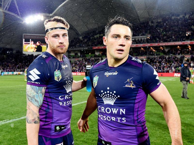Melbourne's Cameron Munster (L) says former teammate Cooper Cronk has added extra flair to his game.