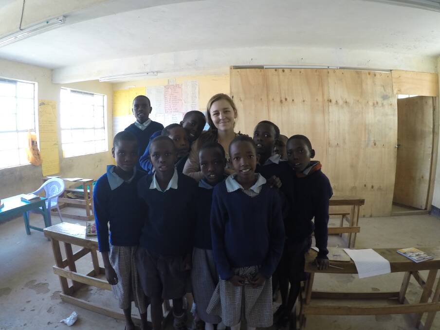 Lauren Jackson with some of the students she taught at the school. 