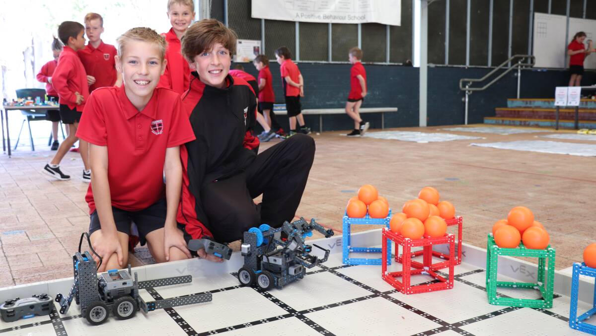 STEM learning: Toby Carr and Josh Hall, both 11, participating in the Amaroo Tech Expo. Photo: Taylar Amonini.