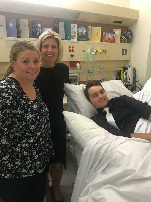 Fighting fit: Liam Shephard was not going to let his friends graduate without him as he live streamed from Royal Perth Hospital. Photo: Supplied.