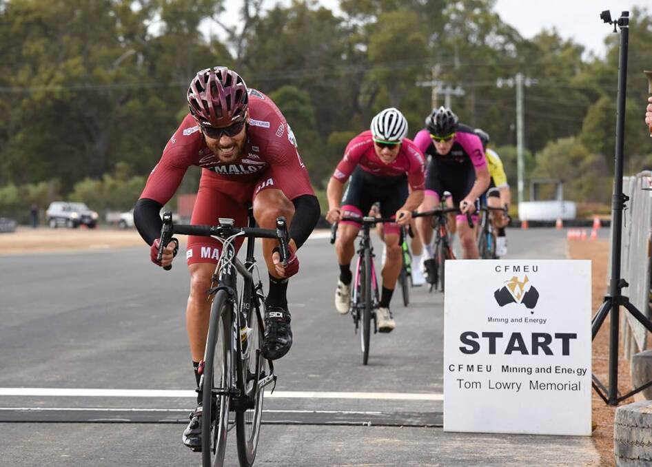 Stephen Hall sprints to the finish line to win the 2019 CFMEU Tom Lowry Memorial on May 4