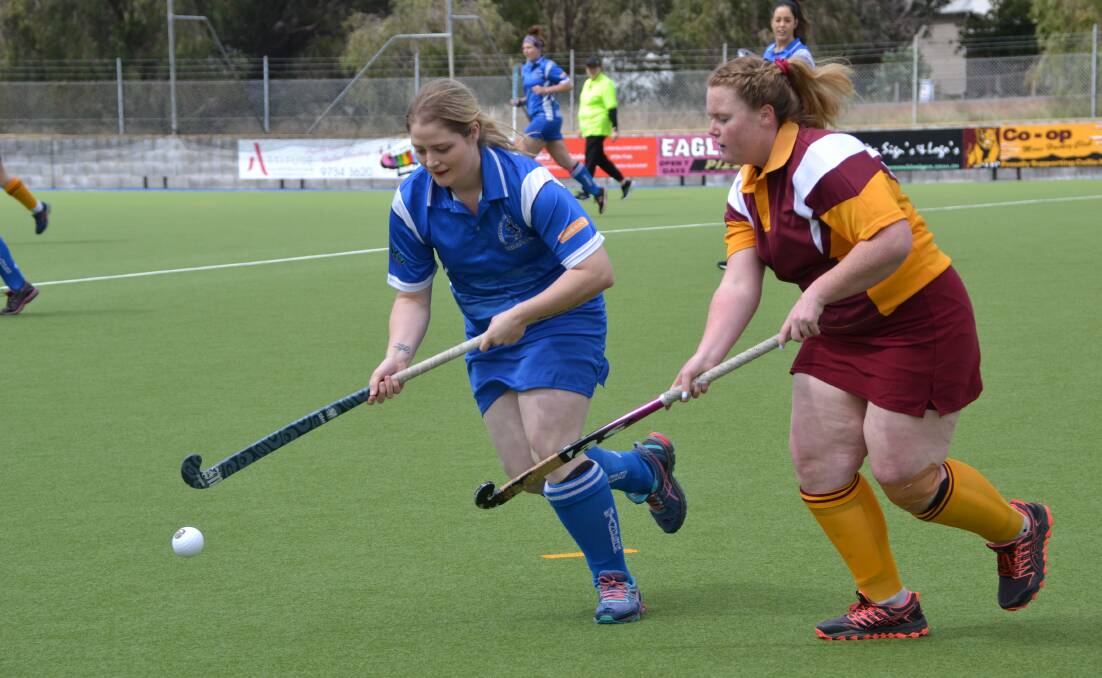 A-reserve grand final: Mustangs' Chandler May up against Rovers' Caitlin Swan. Photo: Taylar Amonini.