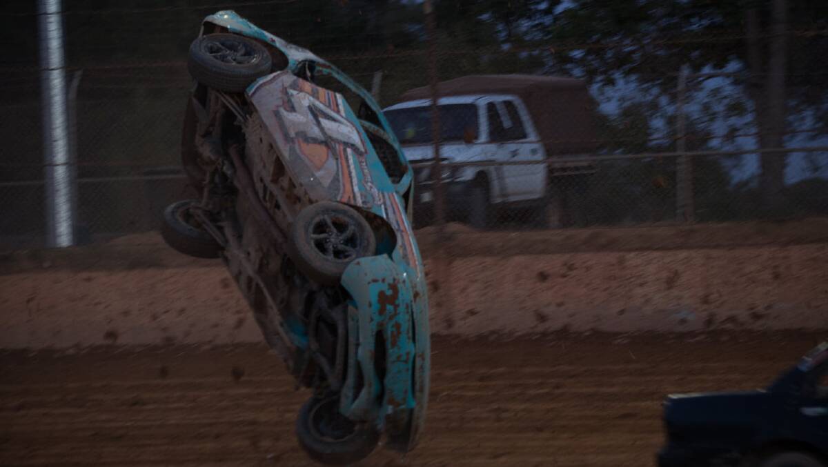 Wild ride: Ethan Genev as his car flipped mid race. Photo: Supplied.