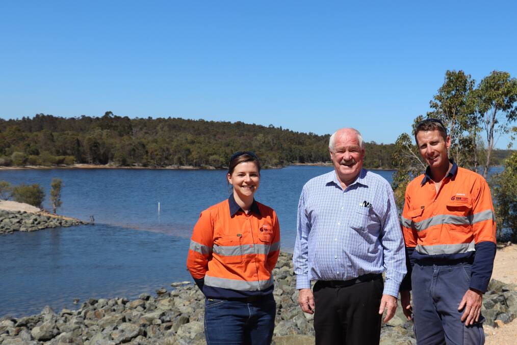 First Flow: Premier Coal environmental superintendent Emily Evans and surveyor Darryn O'Brien with Member for Collie-Preston Mick Murray. Photo: Taylar Amonini.