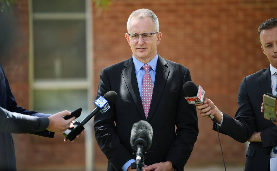 Communications Minister Paul Fletcher talks to journalists in Wagga Wagga in November after meeting regional media leaders.